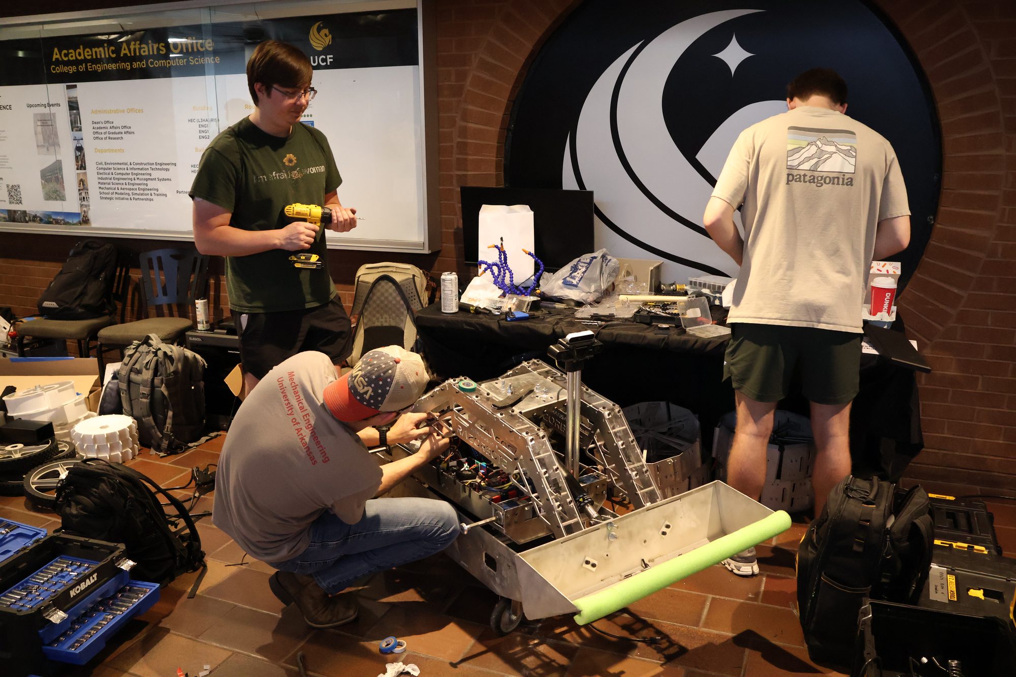 2026 team with robot on the beach
